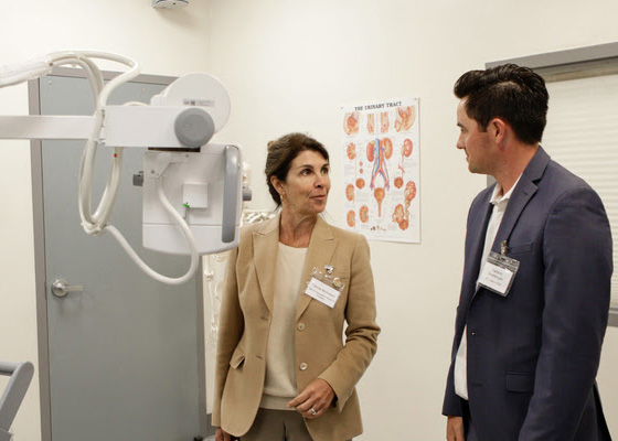 Guests examining some of the new equipment in the Radiography Lab