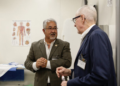 Professor Oda guiding a guest through the new Radiography Lab